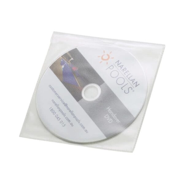 A CD labeled Narellan Pools Hand-over DVD is shown in a clear plastic sleeve. The disc features the company logo with a sun icon and contact information, including an email address and phone number.
