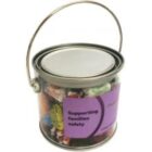 Clear paint-style bucket filled with assorted candies, labeled “Supporting families safety.”.