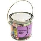 Small paint can filled with assorted candies, labeled Supporting families safety.