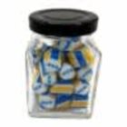 Hexagonal jar with a black lid, filled with blue, yellow, and white striped candies.