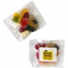 Two clear plastic bags of colorful gummy candies, one labeled dennis family homes.