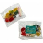 Two clear plastic bags filled with assorted colorful gummy candies.