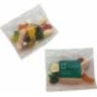 Two clear bags containing assorted colorful gummy candies, photographed on a white background.