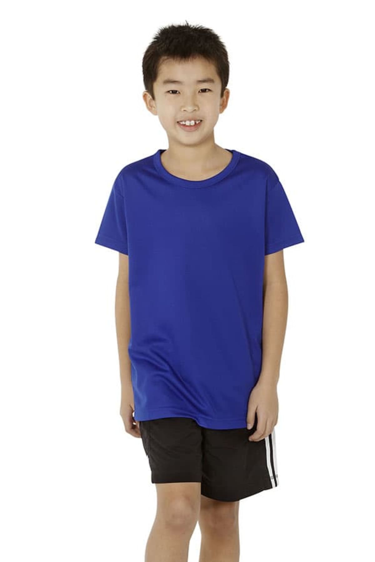 A smiling child stands against a plain background, wearing a bright blue T-shirt and black shorts with white stripes. They have short dark hair and are facing the camera.