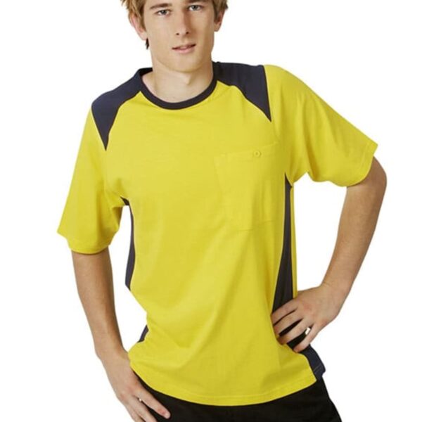 Person in a yellow and black shirt standing with one hand on hip.