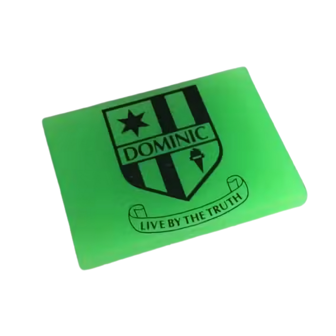 Fluro green eraser with black crest labeled DOMINIC and motto LIVE BY THE TRUTH.