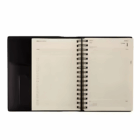An open Kentville Deluxe A5 Diary, spiral-bound, blank pages, black cover.
