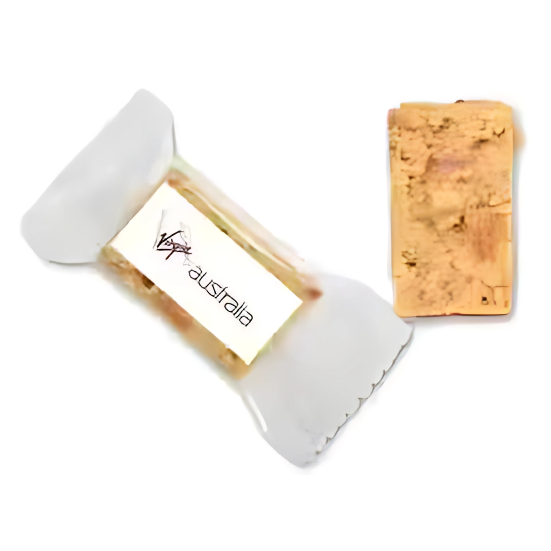 A wrapped and unwrapped Dried apricot mini bar gluten free on a white background.