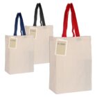 Three beige tote bags with red, black, and blue handles and blank tags attached.
