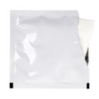 White, partially opened wipe packet, showing a small portion of the wipe.