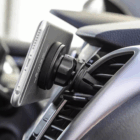 Smartphone secured with strong magnets on the Car Air Vent Phone Holder.