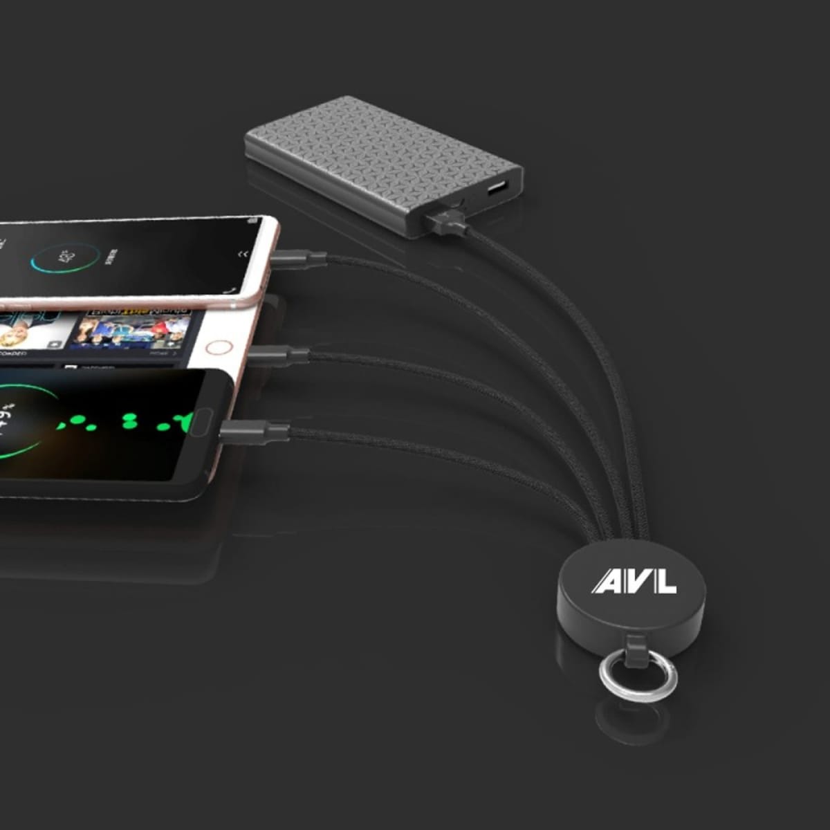 Multi-device charging hub connecting two phones and a power bank on a dark background.
