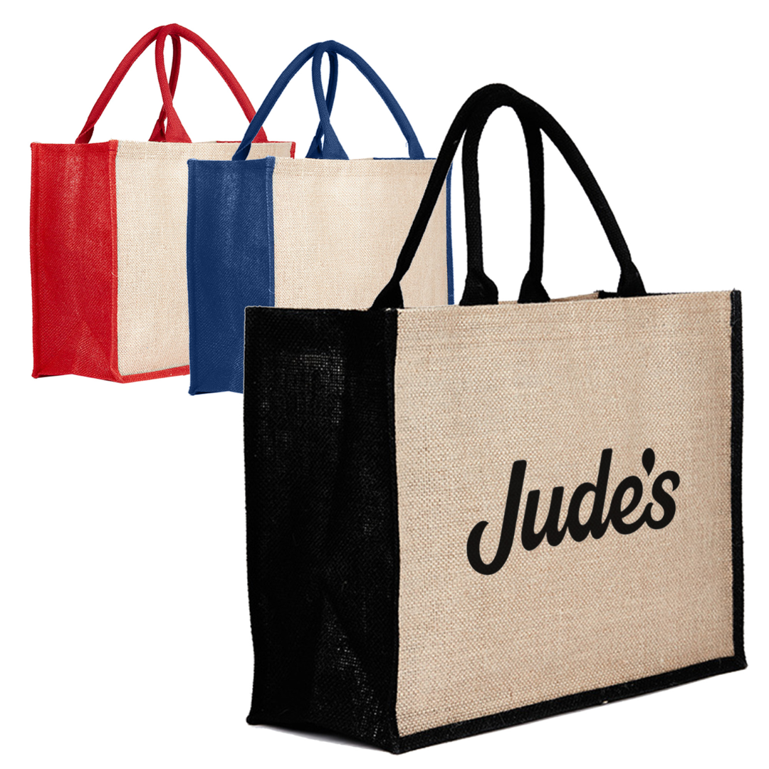 Three Kala Jute coloured bags—black, blue, red—with Judes on the front.