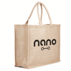 Kala Jute natural Bag in beige with nano and black skateboard graphic on the side.