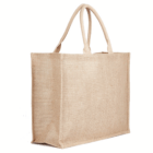 Kala Jute natural Bag in plain beige with two handles, standing upright on a white background.