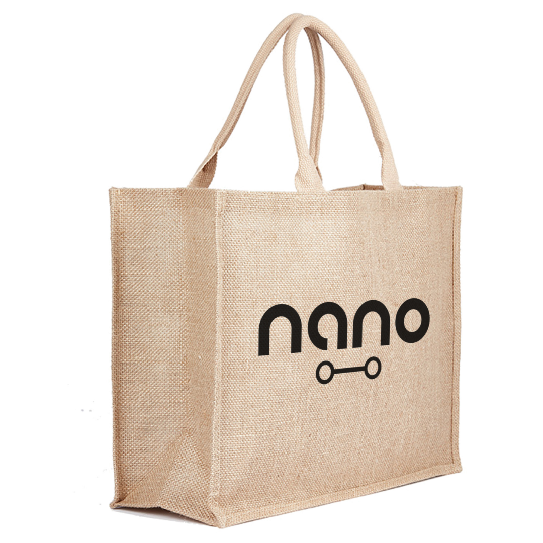 Kala Jute natural Bag in beige with nano and black skateboard graphic on the side.