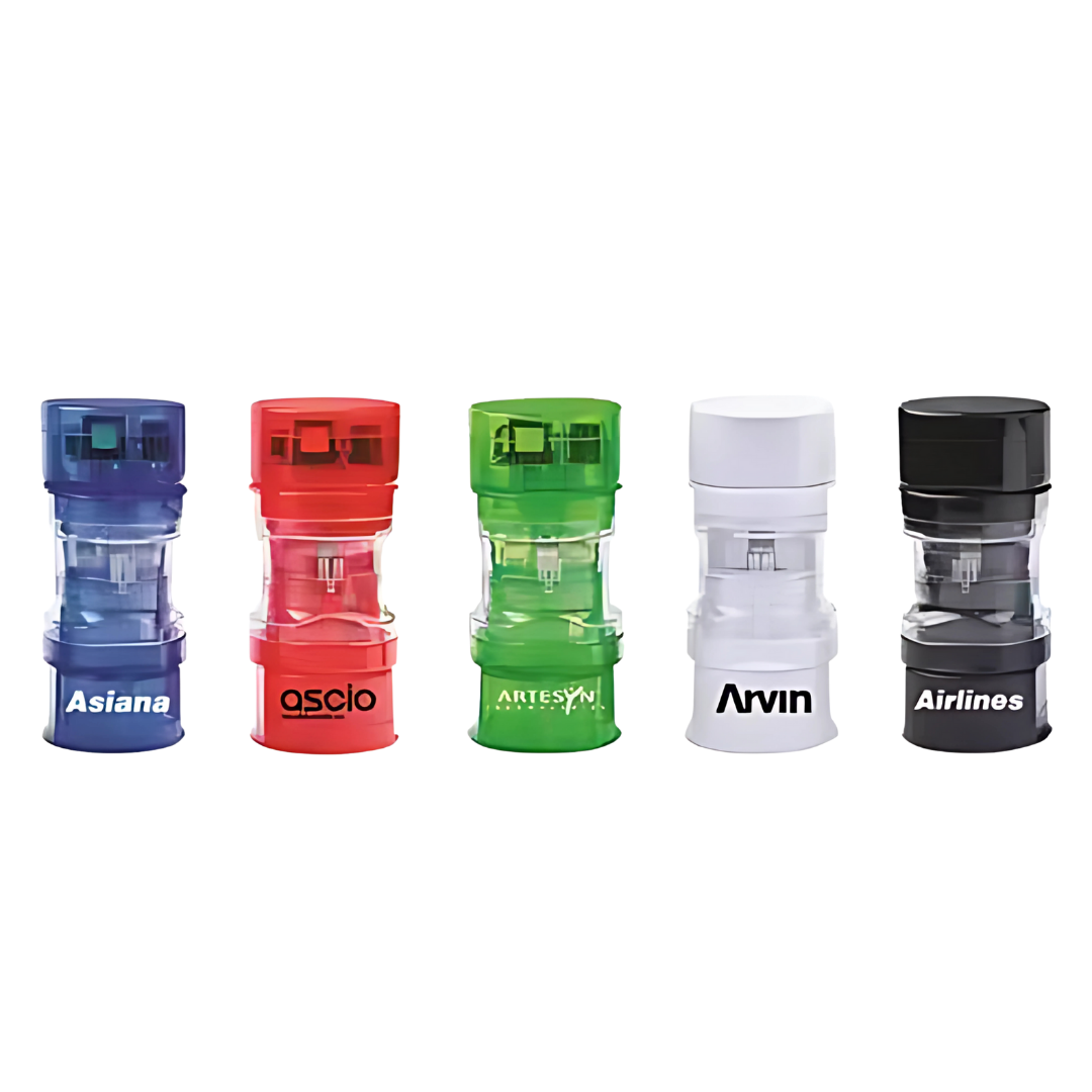 Five colorful self-inking stamps line up next to each Rounder Travel Adapter & USB Port.