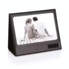 A photo of a couple on a dock in the Fold up Desk Photo Frame.