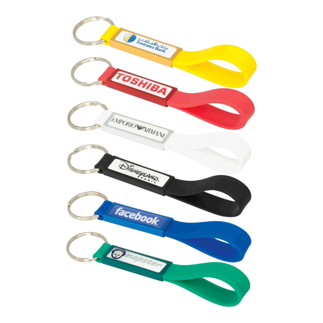 Six Dekota Silicon Loop Key Rings with brand logos, each on a sturdy metal keyring.