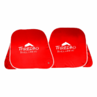 Two red foldable car sun shades with white Thredbo logo—great promotional accessories.