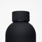 Matte black bottle with a black cap against a white background.