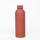 A matte, rust-colored water bottle with a screw cap on a white background.