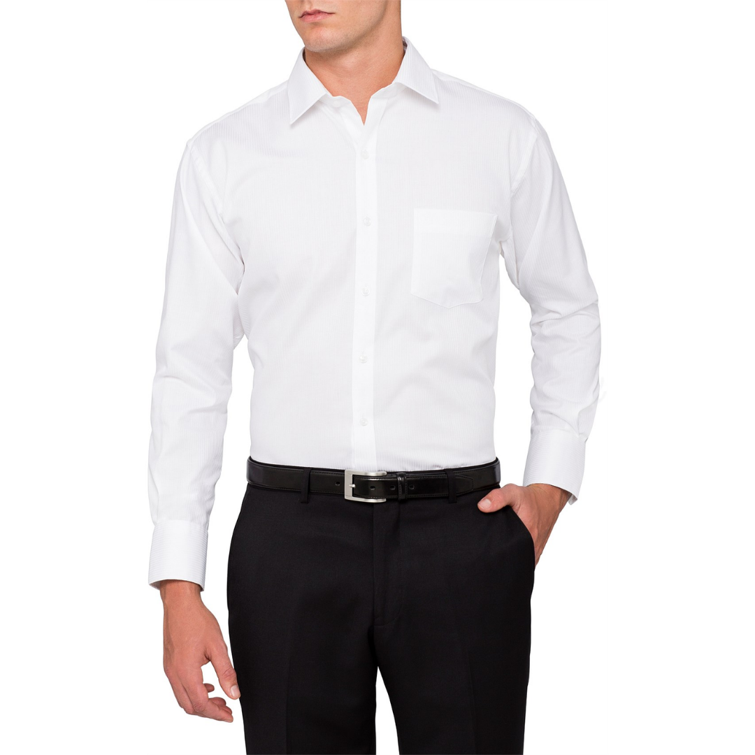 Man in a Van Heusen Euro Fit Shirt Herringbone and black trousers, hand in pocket.
