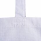 Close-up of a white canvas tote bag showing the reinforced stitching where the handle attaches to the bag. The fabric texture and stitching details are prominently visible.