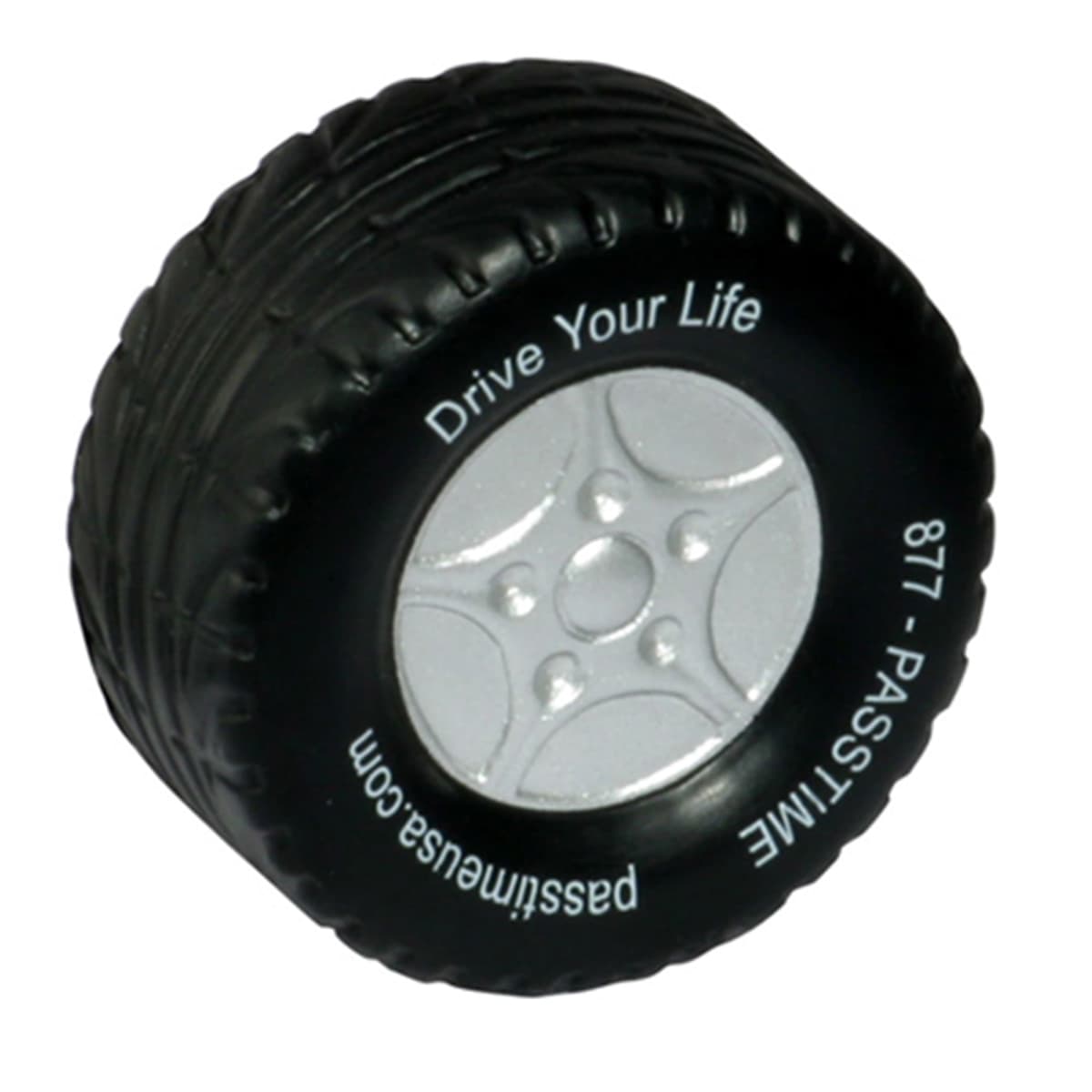 A small, round, black stress ball shaped like a tire with silver detailing in the center, featuring the text Drive Your Life and passmuseums.com with a phone number around the side.