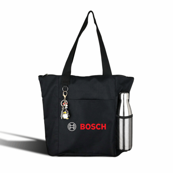 Best Selling Nylon Shopping Tote with keychain and silver bottle in side pocket.