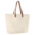Large cream canvas tote bag with brown leather handles, standing upright on a white background.
