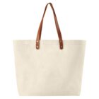 Beige canvas tote bag with brown leather handles, shown on a white background.