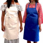 Two women in patterned dresses wear Cotton Drill Aprons With Logo Branding, white and blue.
