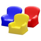 Three small, colorful plastic chairs are arranged together. The chairs are red, blue, and yellow, with a simple and smooth design, suitable for children. They have rounded backs and armrests.
