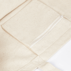 Close-up of a beige Super Shopper Bags Logo Decorated canvas bag with zippered pocket.