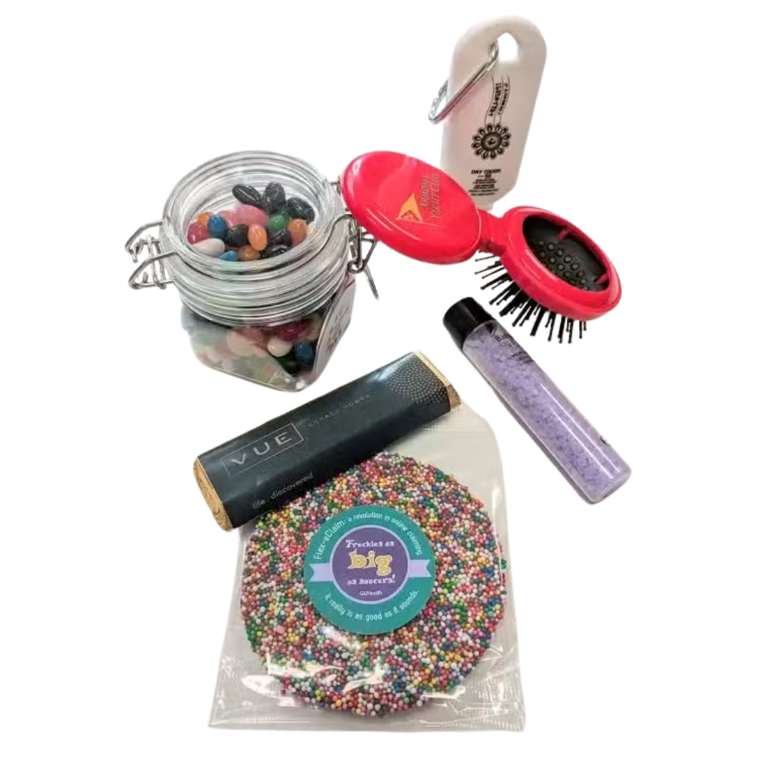 Promotional Pamper Package Kit: includes jelly beans, brush, sprinkles, lip balm, bath salts.