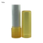 Yellow lip balm tube with its cap off, showing white balm stick.
