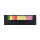 A black pouch containing colorful sticky notes and a clear ruler. The sticky notes are green, yellow, pink, orange, cream, and pink, arranged side by side beneath the transparent ruler within the pouch.