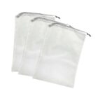 Three white mesh laundry bags with zipper closures, overlapping each other.