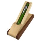 Green pen in a two-tone wooden pen holder with light and dark wood accents.