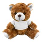 Brown teddy bear wearing a plain white t-shirt, sitting upright on a white background.