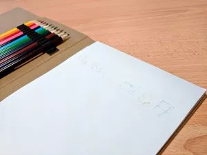 notepad-and-pens-july-19-300x225