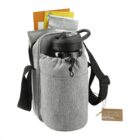 Gray shoulder bag with water bottle, notebooks, and pouches in various compartments.