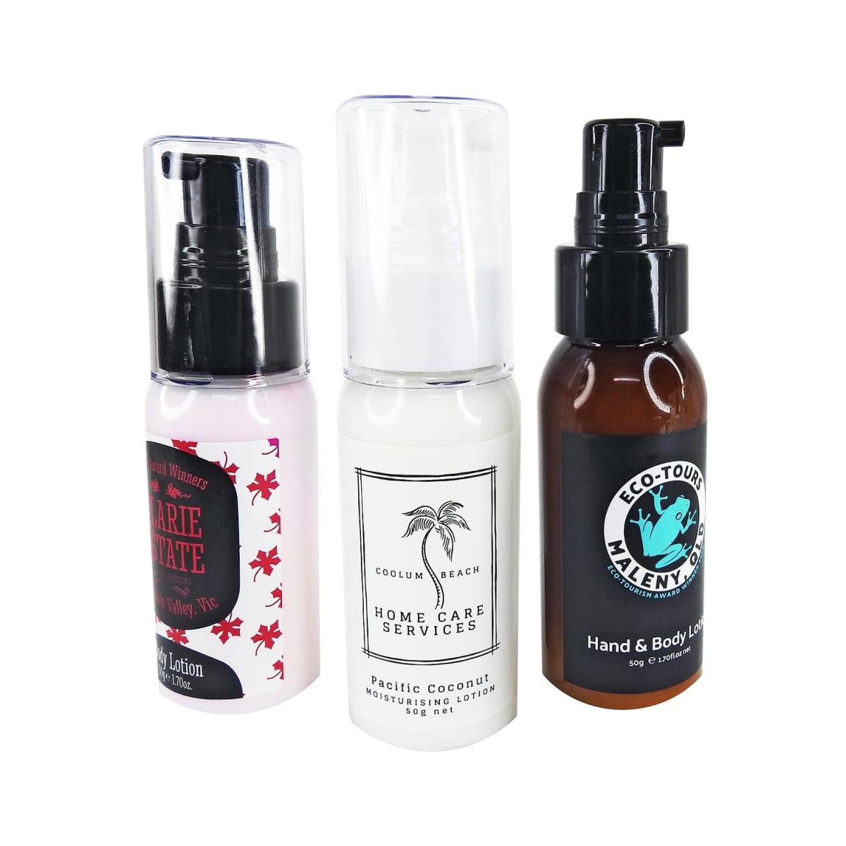 Three different lotion bottles with distinct labels and pump dispensers standing side by side.
