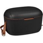Black insulated cooler with brown strap and lid latch.