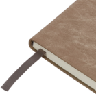 Close-up of a Rustic Look A5 brown leather notebook with a dark bookmark.