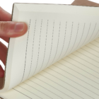Flipping pages of a Rustic Look Promotional A5 Notebook.