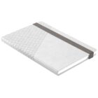 White notebook with a geometric pattern and a gray elastic band wrapped around it.