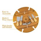 Round wooden cheese board set with knives and wine glass slots.