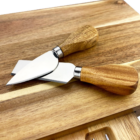 Hattan Branded Cheese Board & Knife Sets with wooden handles and cutting board.